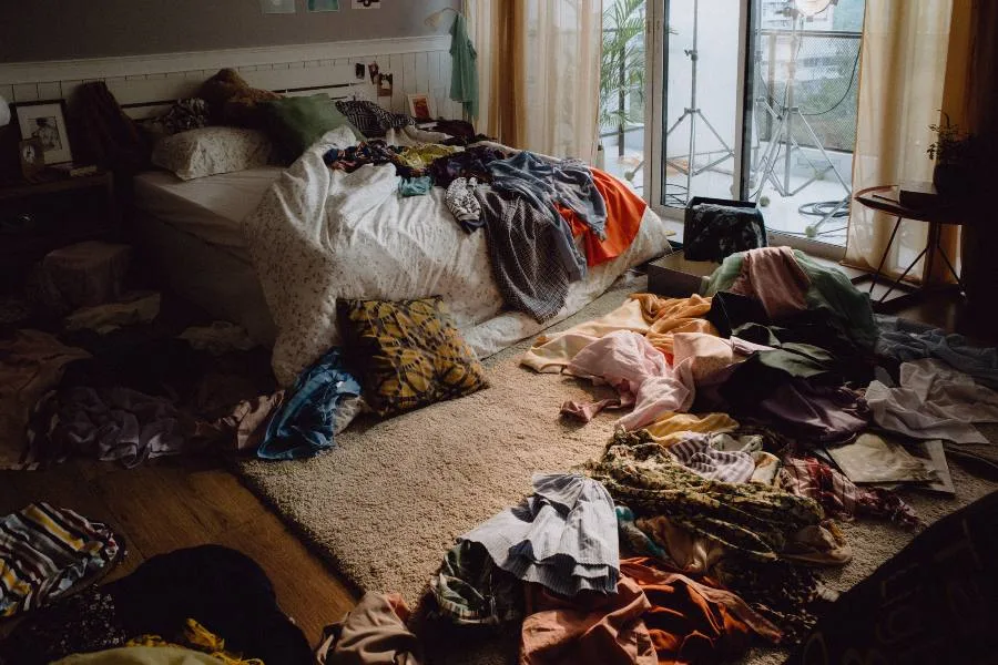 super-messy-room-clothes-are-all-over-the-floor